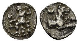 LYCAONIA, Laranda. Circa 324/3 BC. AR Obol (10mm, 0.57 g). Baaltars seated left, holding grain ear, grape bunch, and scepter / Forepart of wolf right;...