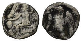 CILICIA, uncertain mint. AR Obol. (11mm, 0.57 g) 4th C. Baaltars seated left, holding grain ear, grape-bunch and sceptre Rev: Eagle standing left on p...