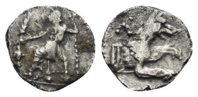 LYCAONIA, Laranda. Circa 324/3 BC. AR Obol (10mm, 0.64 g). Baaltars seated left, holding grain ear, grape bunch, and scepter / Forepart of wolf right;...