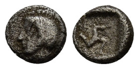 Pamphylia. Aspendos 465-430 BC. Obol AR (0.64 Gr. 7mm.) Helmeted head of Athena left. Rev. Triskeles; in fields: E and pellet, within incuse square.