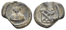 BYZANTINE LEAD SEALS. (17mm, 3.48 g) Obv: Bust facing. Rev: Block monogram.