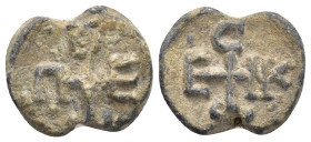 BYZANTINE LEAD SEALS. (17mm, 5.42 g) Obv: Cruciform monogram. Rev: Cruciform monogram.