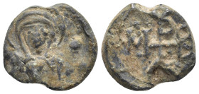 BYZANTINE LEAD SEALS. (18mm, 6.1 g) Obv: Nimbate bust of the Virgin Mary, facing, between two crosses, holding a medallion of a facing head of Christ ...