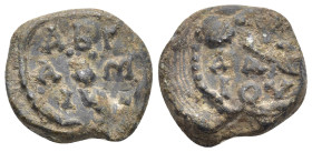 BYZANTINE LEAD SEALS. (18mm, 6.66 g) Obv: Legend in three lines. Rev: Legend in three lines.