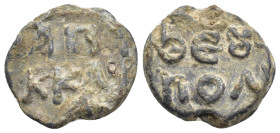 BYZANTINE LEAD SEALS. (19mm, 6.62 g) Obv: Legend in two lines.Rev: Legend in two lines.