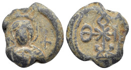 BYZANTINE LEAD SEALS. (19mm, 9.15 g) Obv: Stylized bust of Theotokos (Virgin Mary). Medallion on chest, flanked by two crosses. Rev: Cruciform monogra...