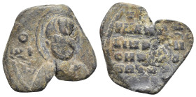 BYZANTINE LEAD SEALS. (23mm, 7.72 g) Obv: Facing nimbate bust of a saint, Rev: Legends five lines.