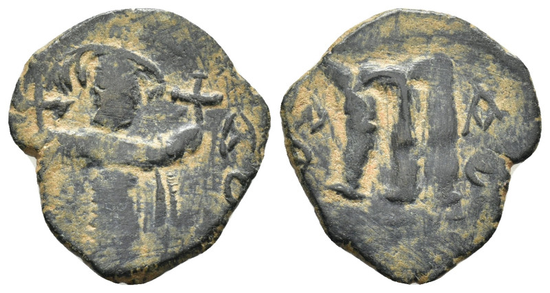 Arab-Byzantine (660-680). Ae. Fals. (20mm, 2.35 g) Obv: Emperor standing facing,...