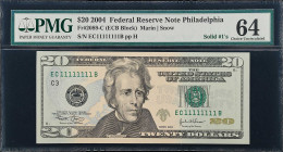 Fr. 2089-C. 2004 $20 Federal Reserve Note. Philadelphia. PMG Choice Uncirculated 64.
An attractive, fresh looking $20 Big Head note with solid serial...