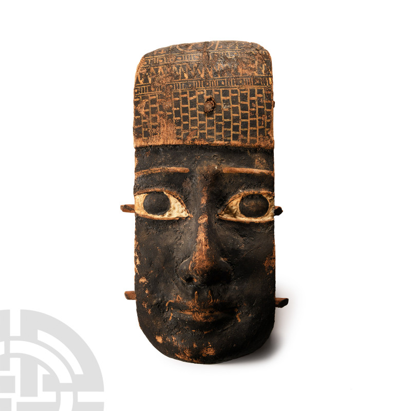 Egyptian Painted Wooden Mummy Mask
4th-3rd century B.C. Displaying semi-natural...