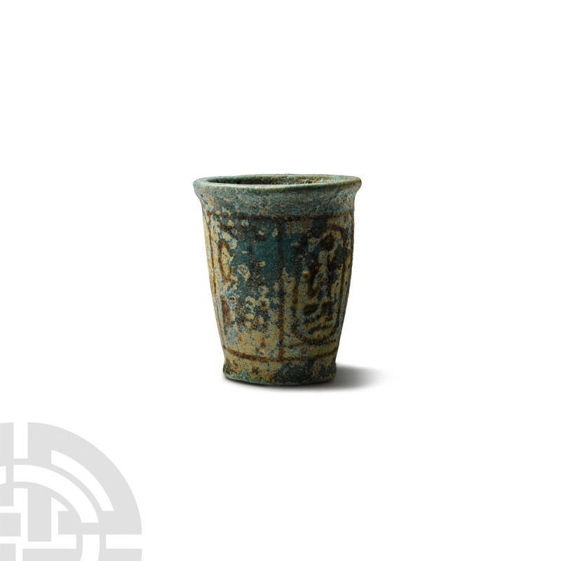 Egyptian Faience Ramesses II Offering Cup
1279-1213 B.C. Glazed blue and painte...