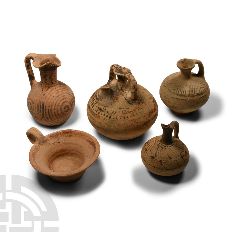 Mycenaean Terracotta Vessel Collection
12th-11th century B.C. Comprising: a sti...