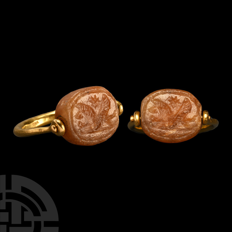 Graeco-Phoenician Stone Scaraboid with Winged Beast in Gold Swivel Ring
Circa 7...