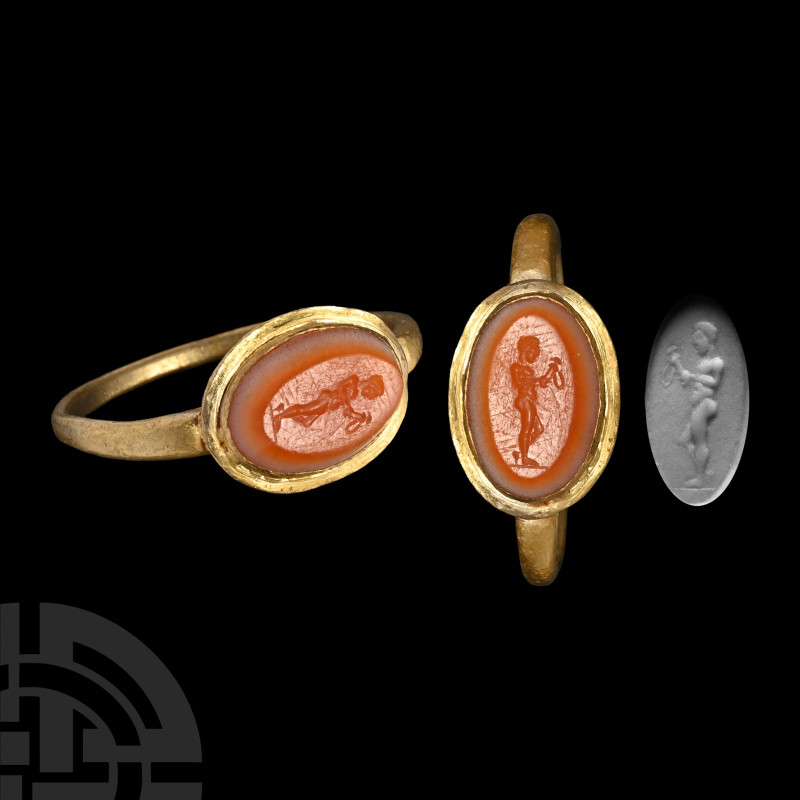 Roman Gold Ring with Theseus Gemstone
1st century A.D.. With flange rim to the ...