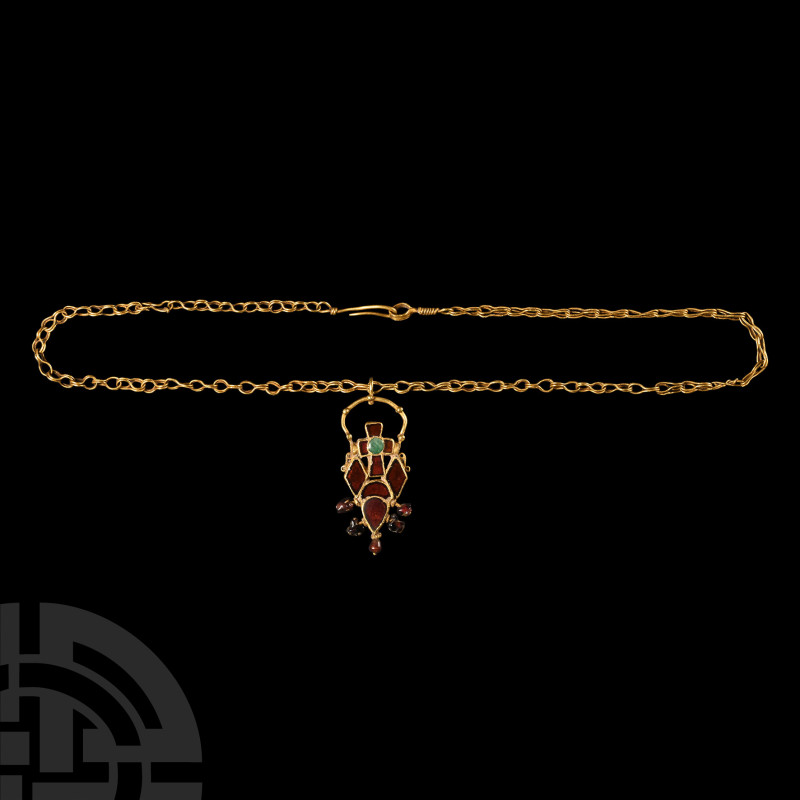 Dark Age Gold and Gemstone Pendant Cross Necklace with Dove-Shaped Garnets.
Cir...