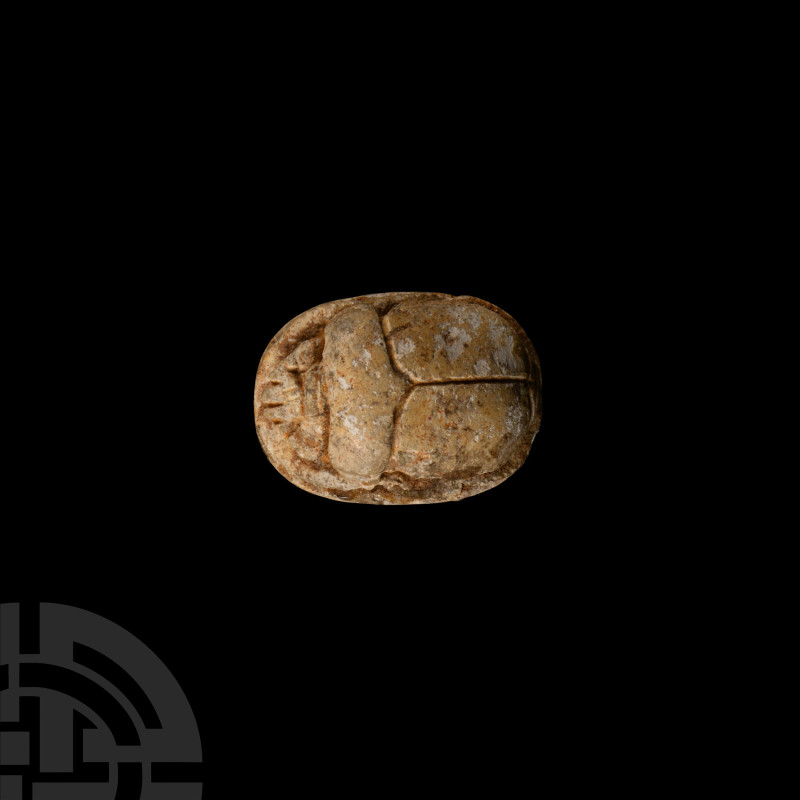 Egyptian Steatite Scarab
Late Period, 664-332 B.C. Displaying semi-naturalistic...