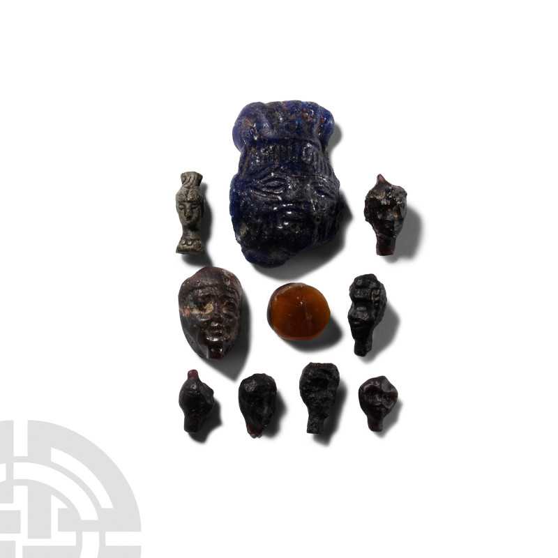 Romano-Egyptian Glass Head Amulet and Gem Collection
Romano-Egyptian, 30 B.C.-3...