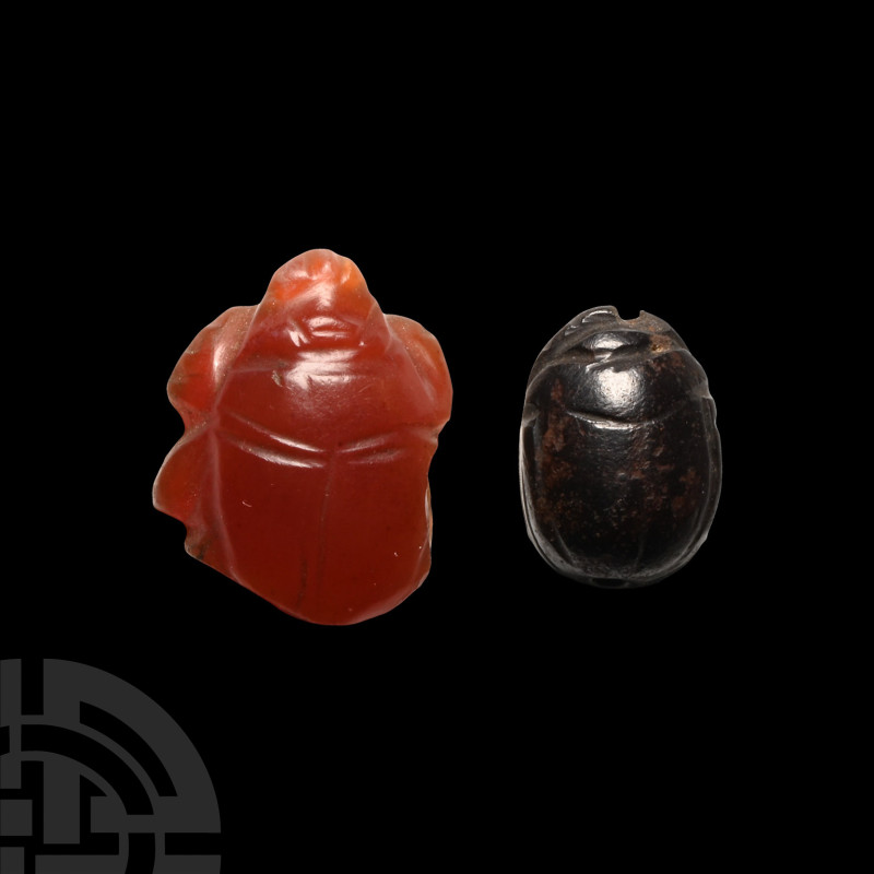 Egyptian Hardstone Scarab Group
Late New Kingdom, 1550-1060 B.C. Both polished ...