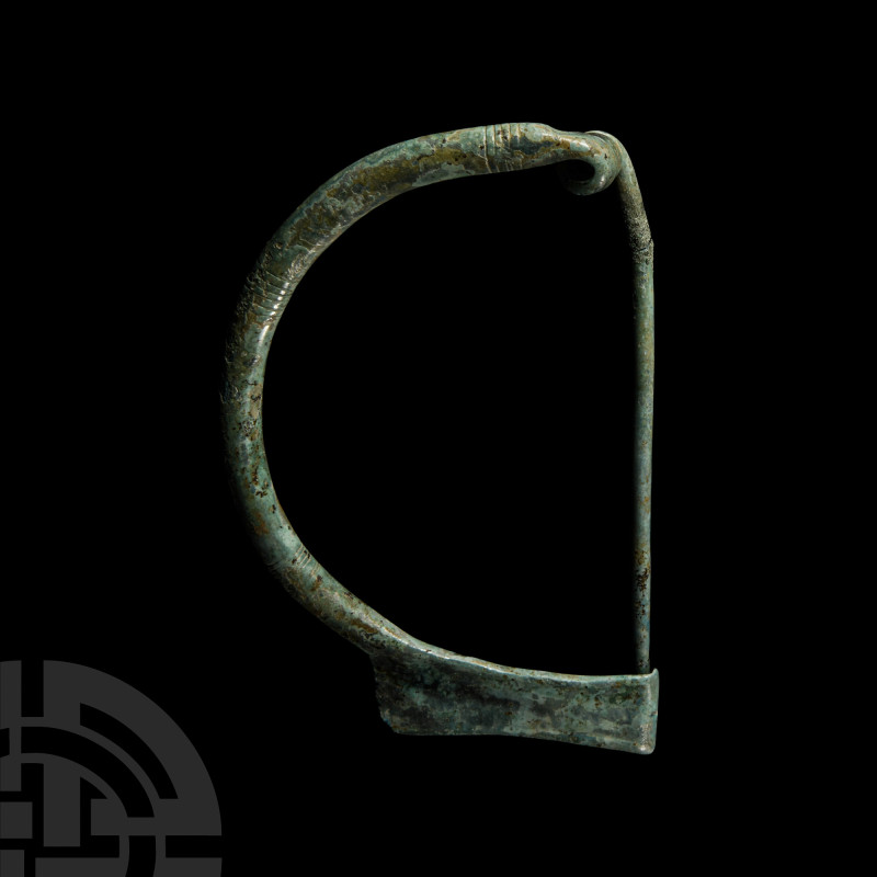 Italic Bronze Bow Brooch
8th-7th century B.C. With a simple curved arch decorat...