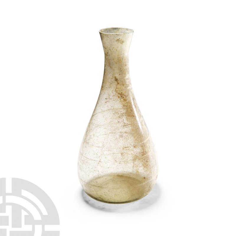 Roman Translucent Glass Flask with Engraved Rings
4th century A.D. Tall with fu...