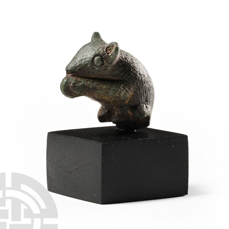 Roman Bronze Mouse Nibbling a Nut Statuette
1st-4th century A.D. Modelled with ...