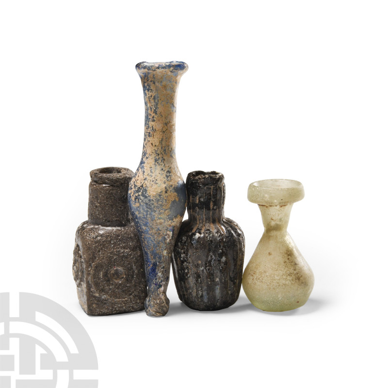 Roman Glass Vessel Collection
1st-4th century A.D. Miniature vessels including ...