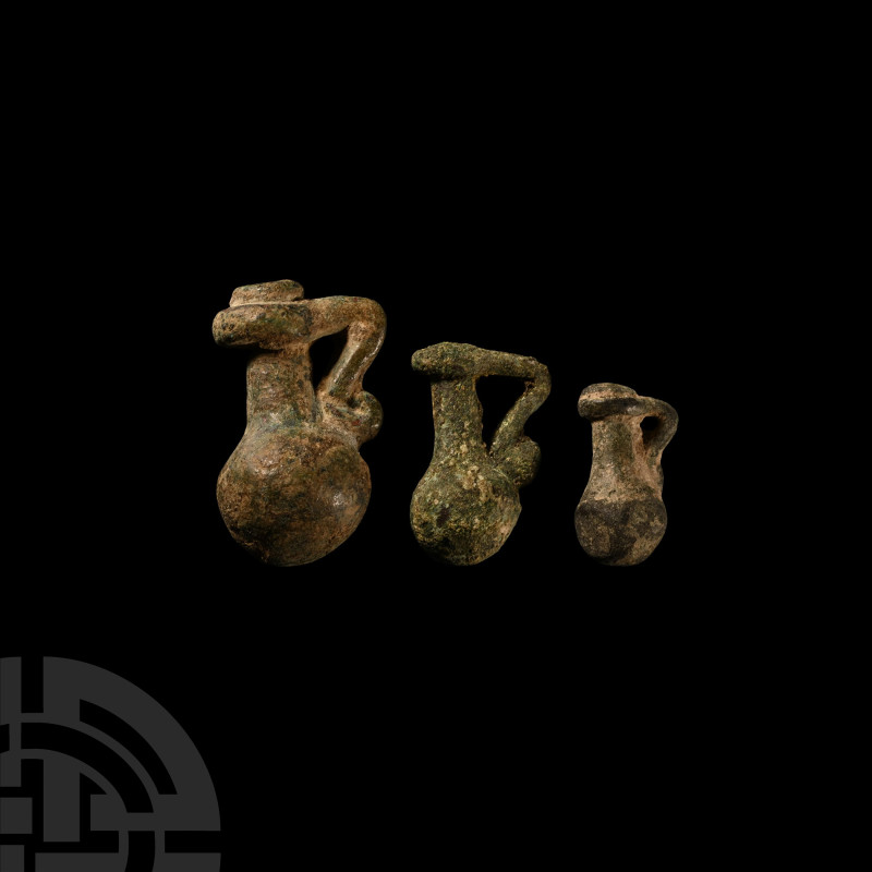 Roman Bronze Jug Weight Collection
1st-4th century A.D. Three graduated jug-sha...