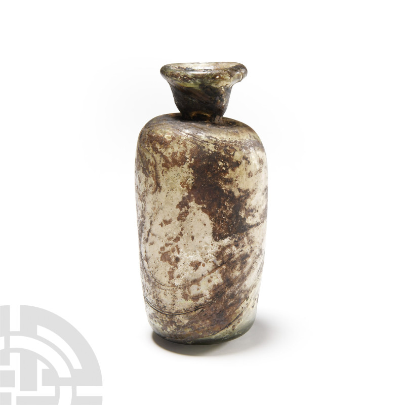 Roman Glass Barrel-Shaped Flask
2nd-3rd century A.D. Cylindrical shape with fla...