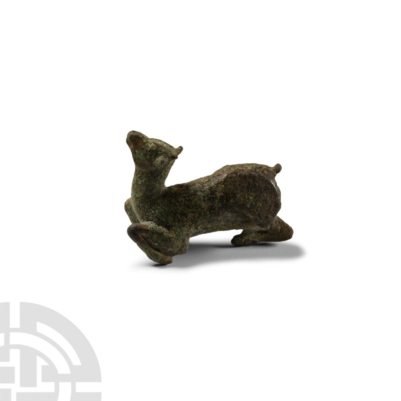 Roman Bronze Recumbent Deer Statuette
1st-4th century A.D. Modelled in the roun...