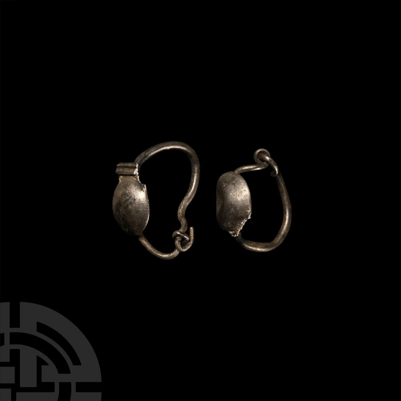 Roman Silver Earring Pair
Circa 1st-4th century A.D. Each composed of a taperin...