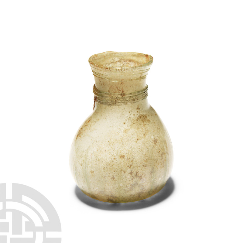 Byzantine Ribbed Glass Cosmetic Bottle with Trail
Circa 5th-6th century A.D. Gl...