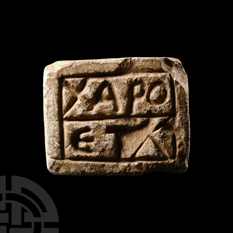 Byzantine Stone Bread Stamp
6th-10th century A.D. Rectangular with pierced lug ...