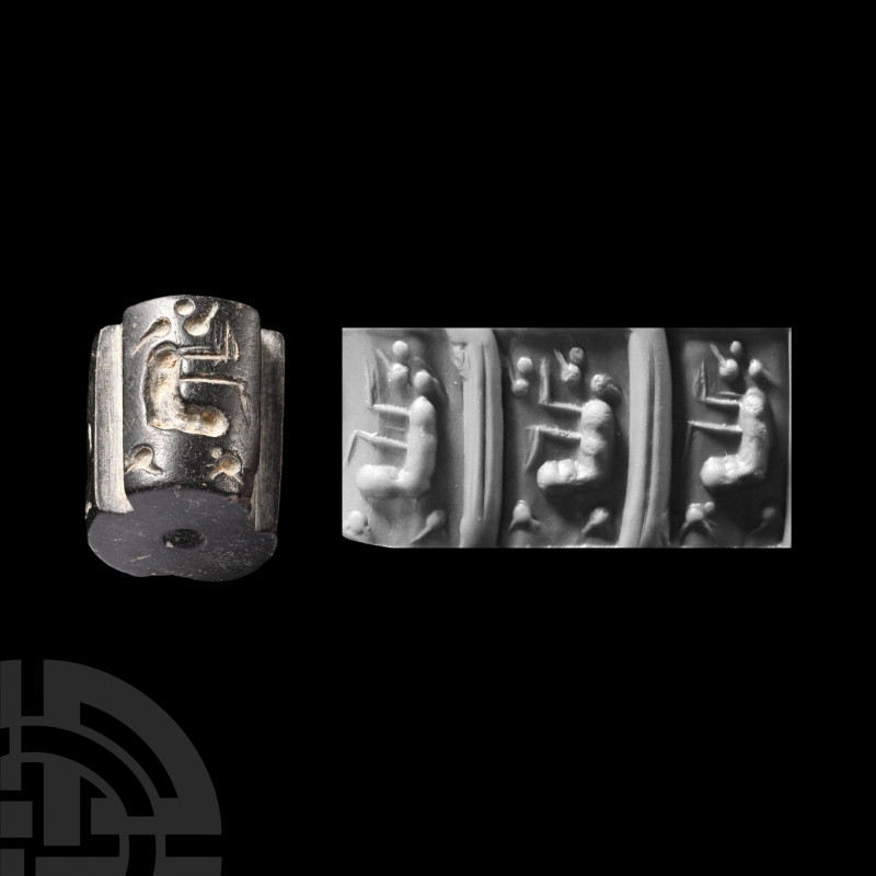 Uruk Black Stone Cylinder Seal with Seated Figure
Circa 2nd-1st millennium B.C....