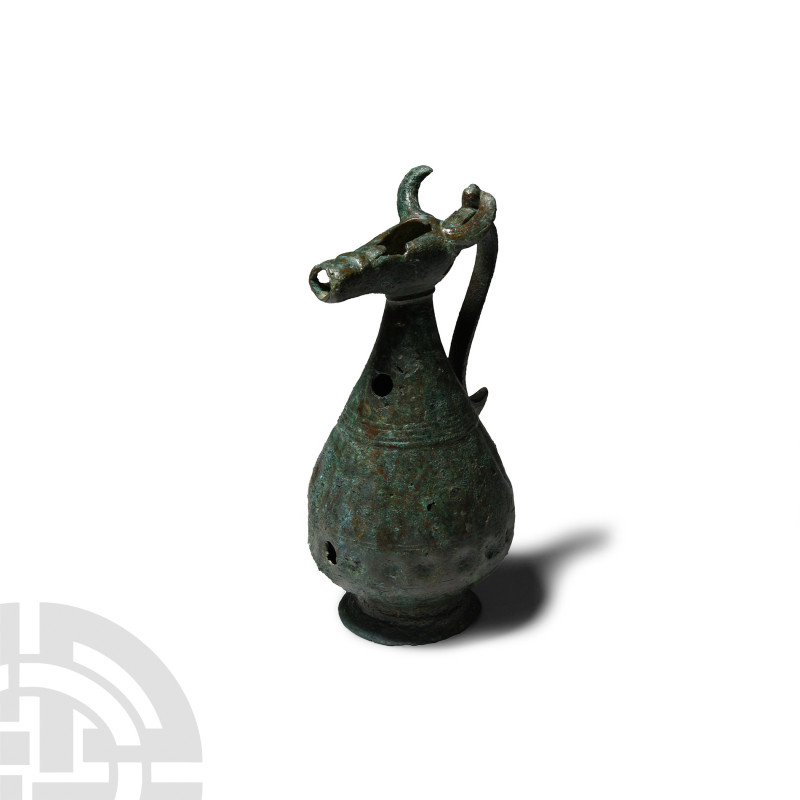 Post-Sassanian Bronze Ewer
8th-10th century A.D. With waisted neck piriform bod...