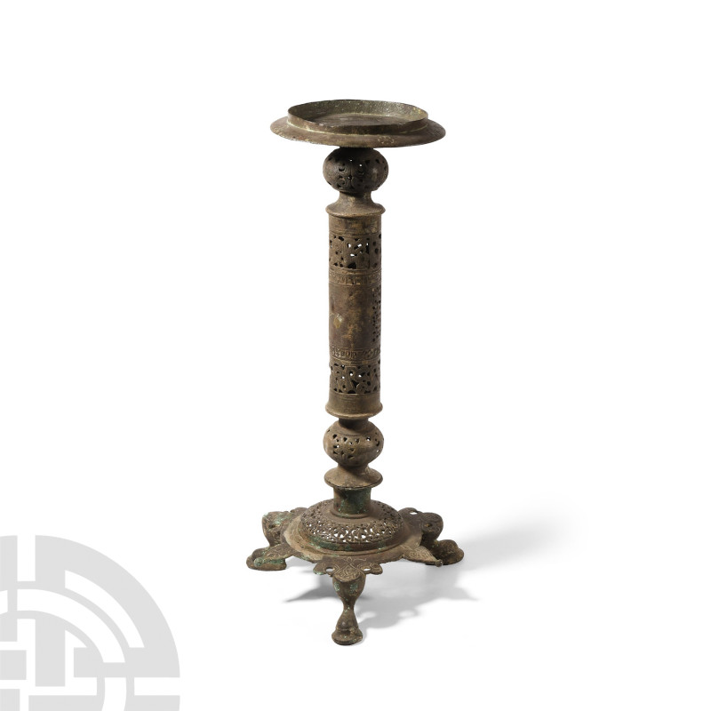 Western Asiatic Bronze Openwork Lamp Stand
Circa 12th century A.D. Hollow-forme...