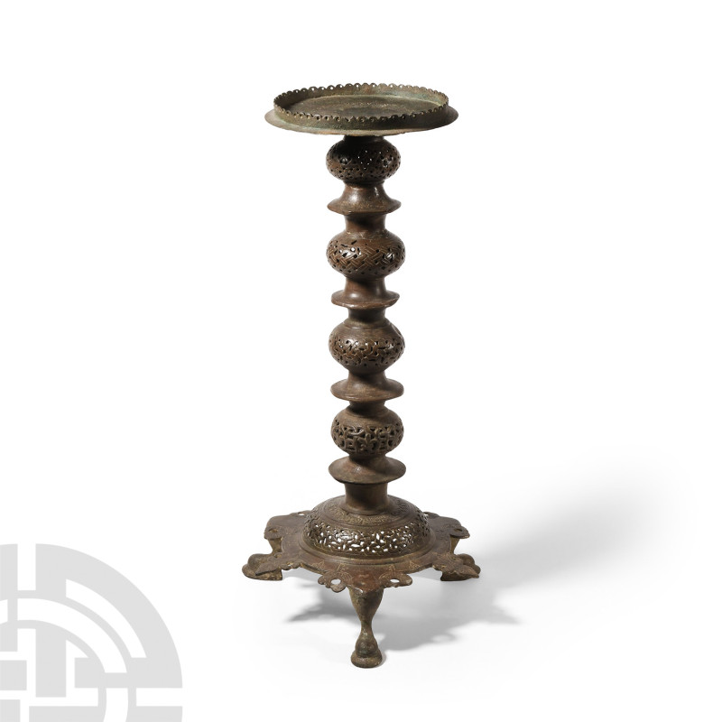 Western Asiatic Bronze Openwork Lamp Stand
Circa 12th century A.D. Hollow-forme...