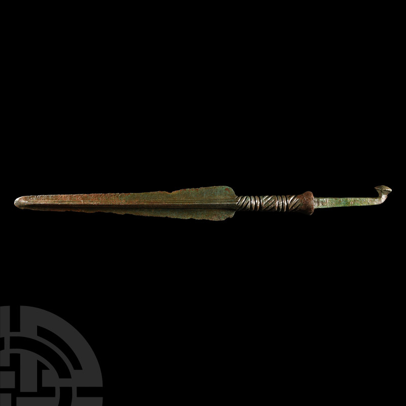 Marlik Type Bronze Decorated Spearhead
13th-12th century B.C. With a long blade...