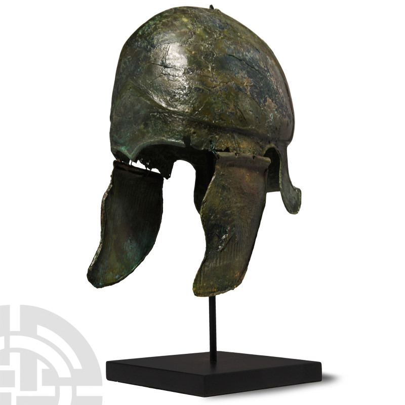 Greek Bronze Chalcidian Helmet
5th-4th century B.C. Of Kunze Group VII, formed ...