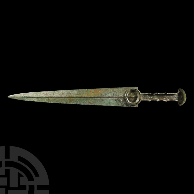 Luristan Bronze Short Sword
Circa 1000 B.C. The blade with a tapering profile, ...