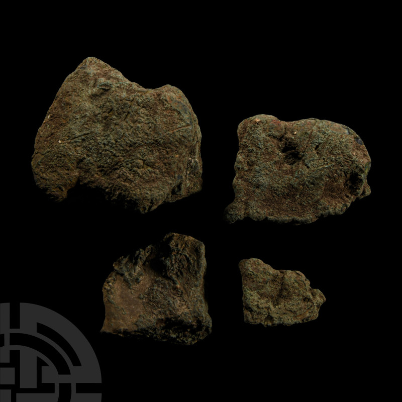 Bronze Age Pancake Ingot Fragment Group
2nd-1st millennium B.C. Comprising four...