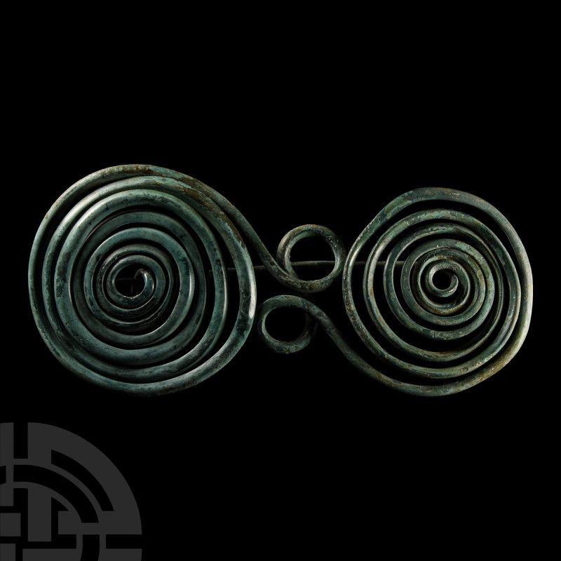 Bronze Age Spectacle Brooch
8th-7th century B.C. Comprising a pair of opposing ...