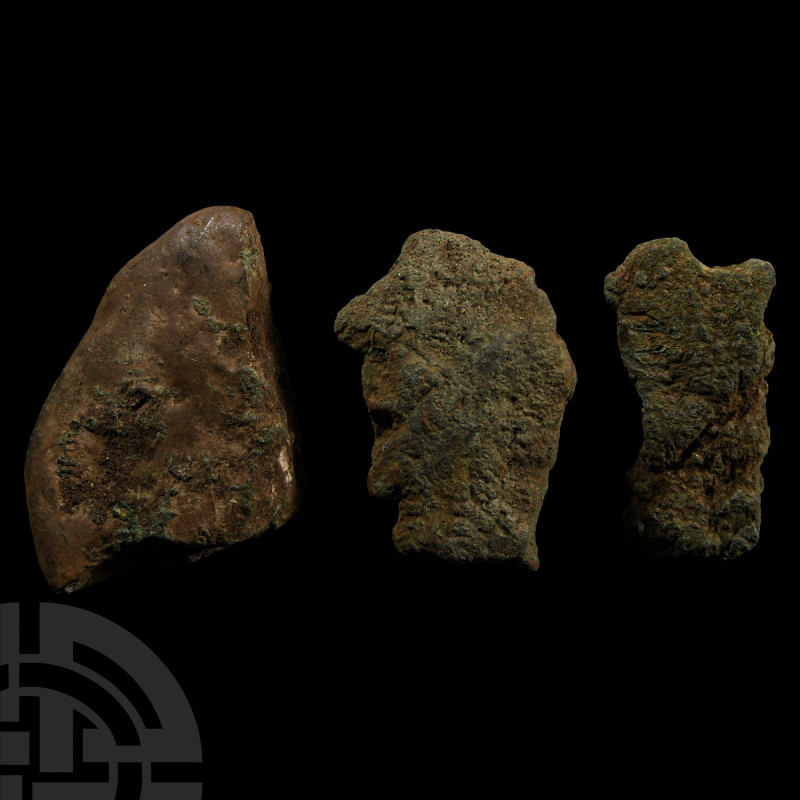 Bronze Age Pancake Ingot Fragment Group
2nd-1st millennium B.C. Comprising thre...