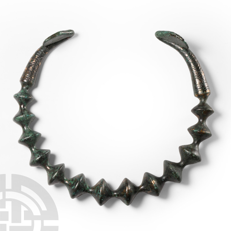 European Iron Age Celtic Bronze Torc
Circa 3rd-2nd century B.C. The penannular ...