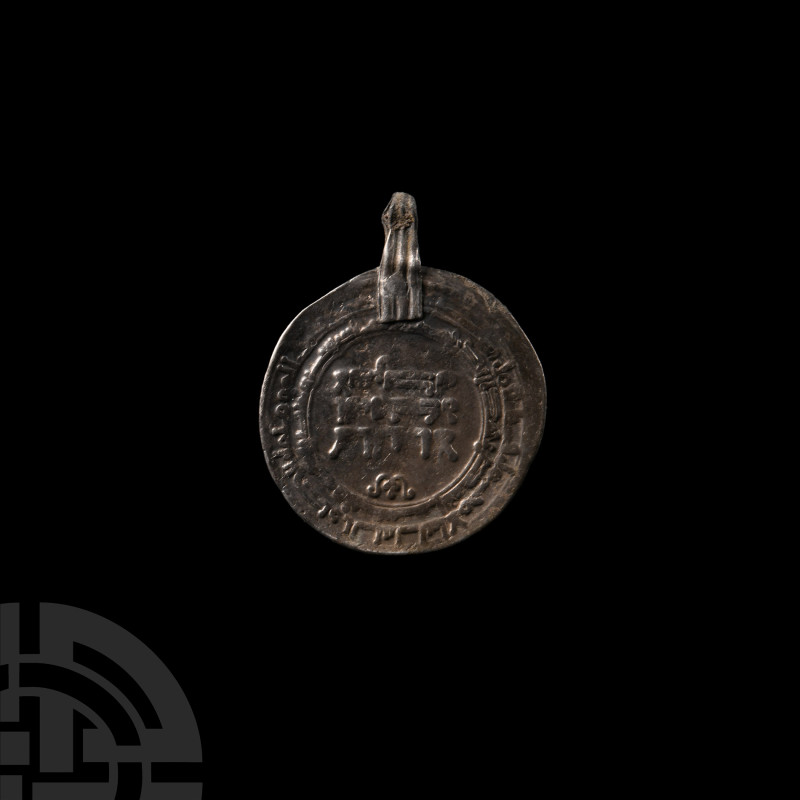 Viking Age Silver Coin Pendant
9th-11th century A.D. With ribbed suspension loo...