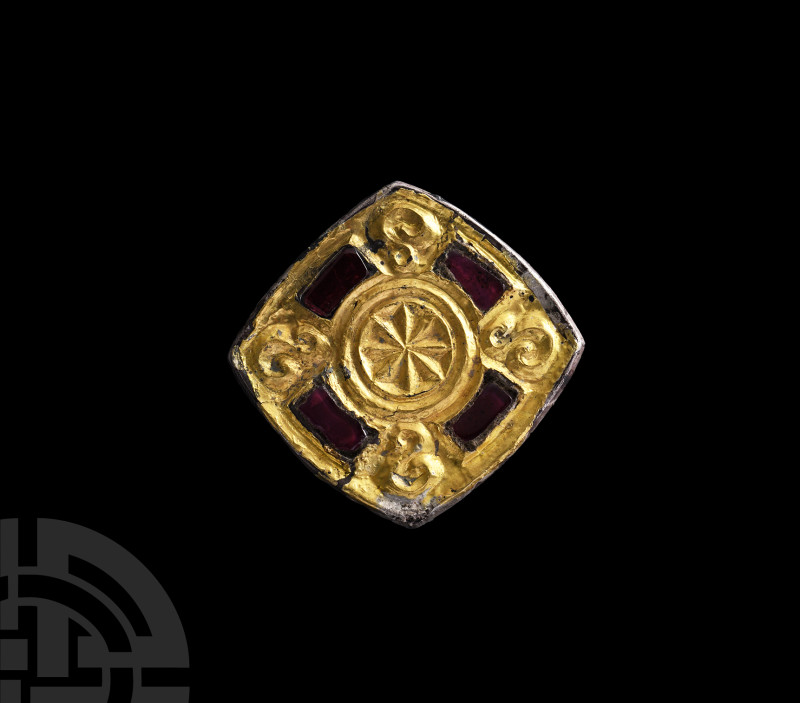 Merovingian Silver-Gilt Brooch with Garnets
6th-7th century A.D. The edges slig...