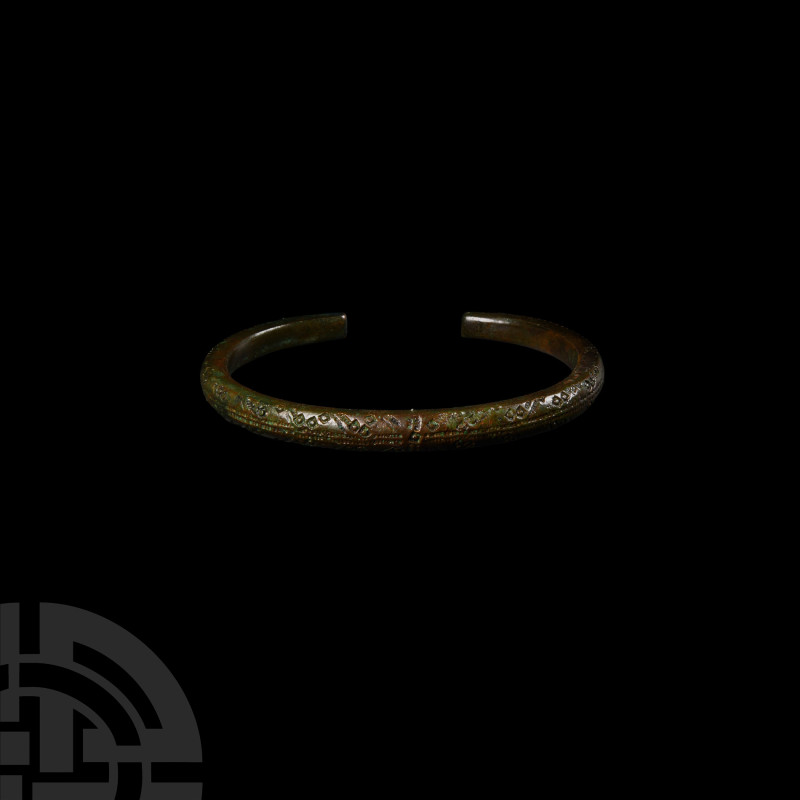 Viking Age Decorated Bronze Bracelet
9th-11th century A.D. Of penannular form, ...