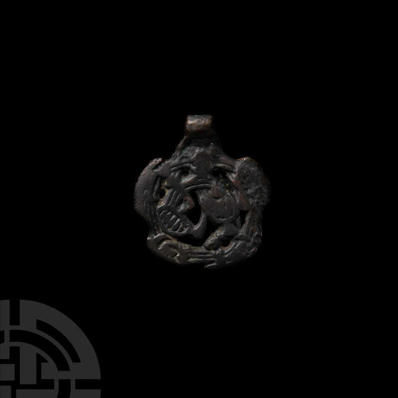 Viking Age Bronze Contorted Gripping Beast Pendant
Late 10th-early 11th century...