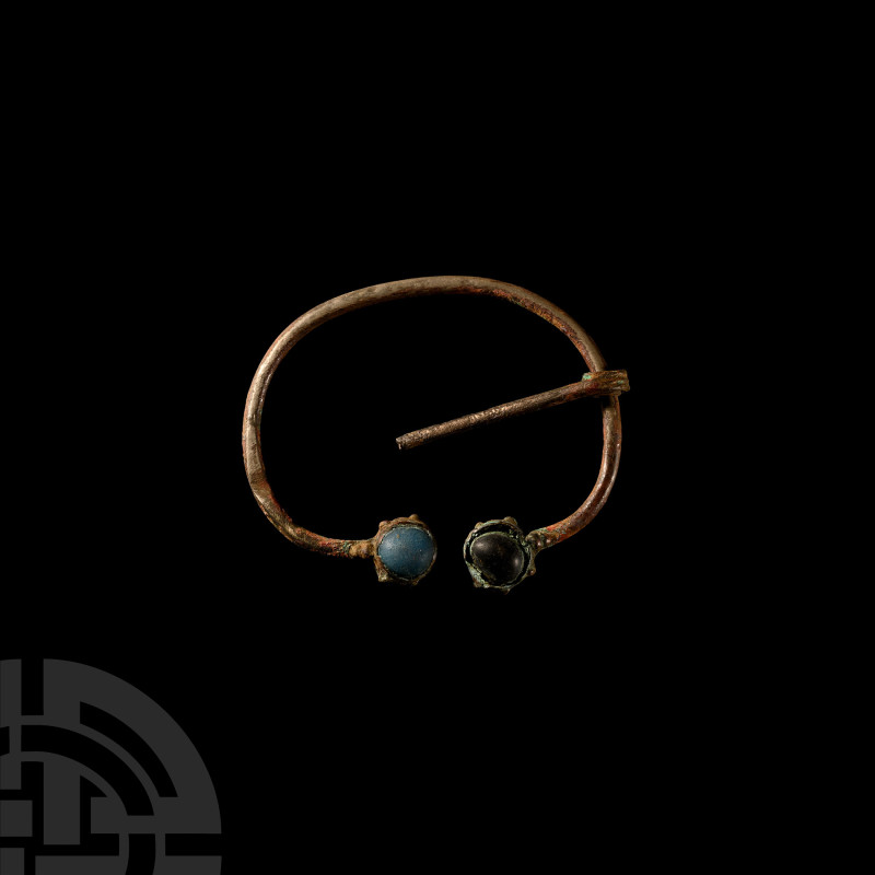 Viking Age Bronze Penannular Brooch with Cabochons
8th-12th century A.D. Retain...