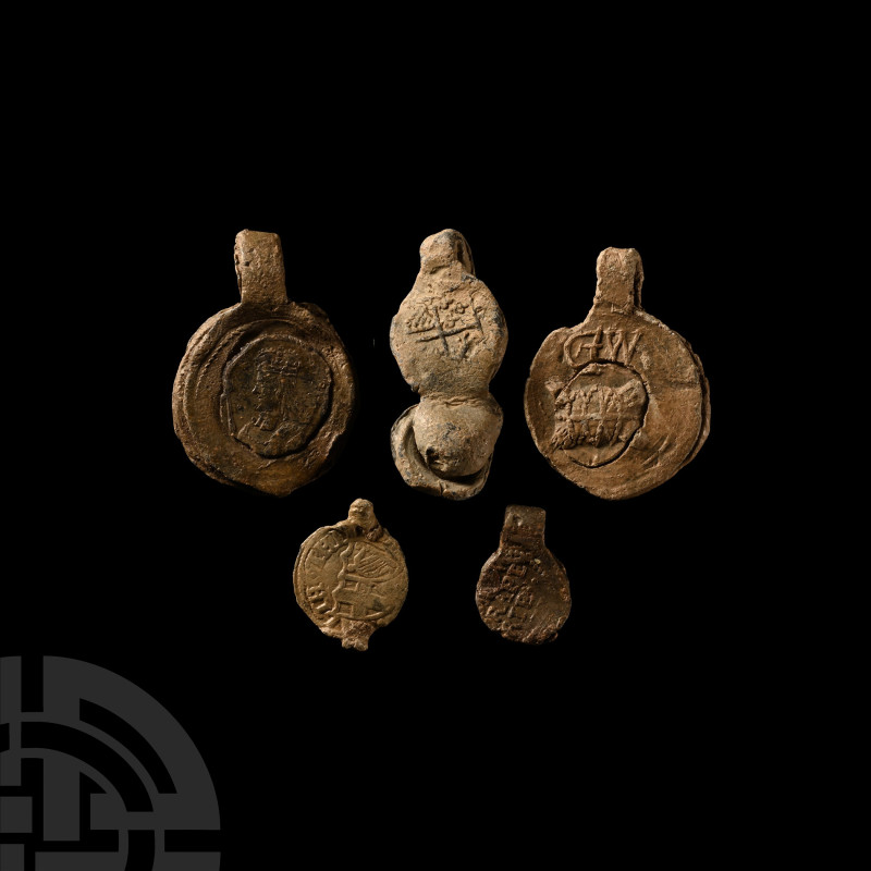 Medieval Lead Bag and Tax Seal Group
14th century A.D. and later. One bearing t...