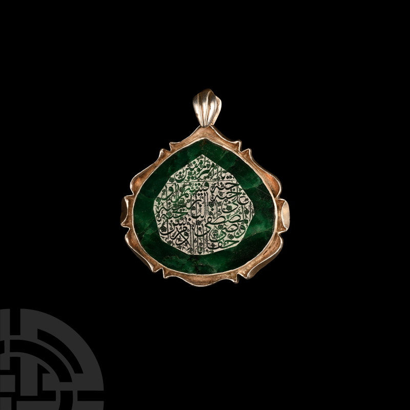 Calligraphic Emerald Gem in Silver-Coloured Metal Pendant
Late 20th century A.D...